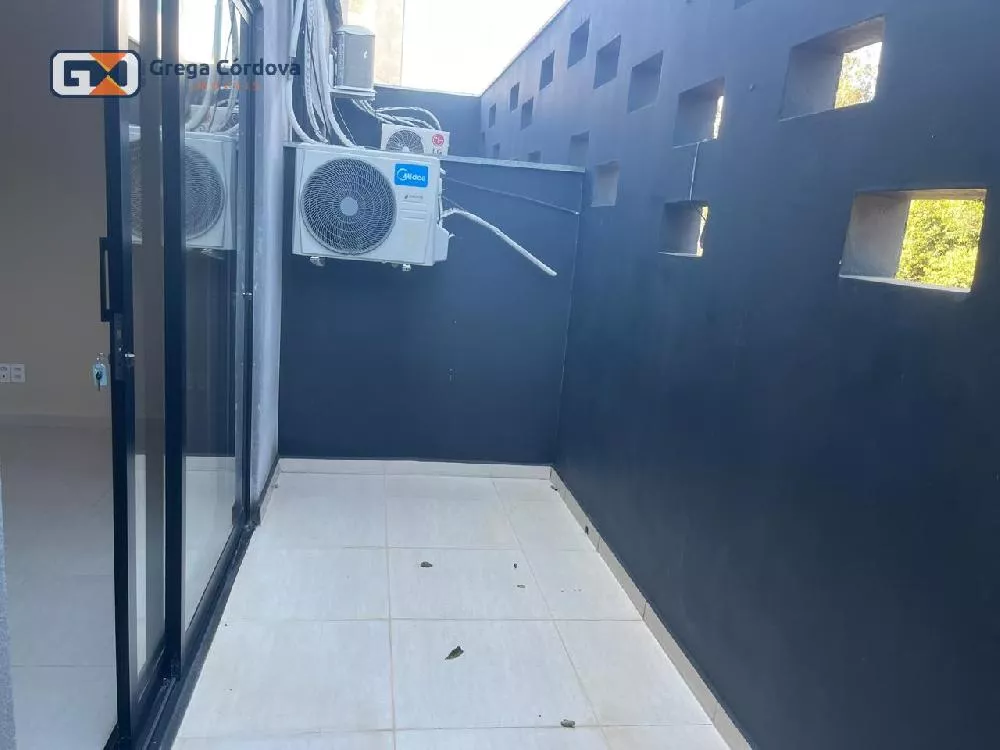 Sala comercial com varanda 